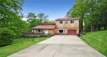 Welcome home to 24 Blueberry Lane in Cecil Twp...