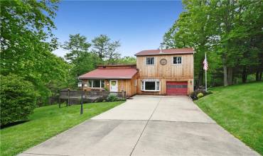 Welcome home to 24 Blueberry Lane in Cecil Twp...
