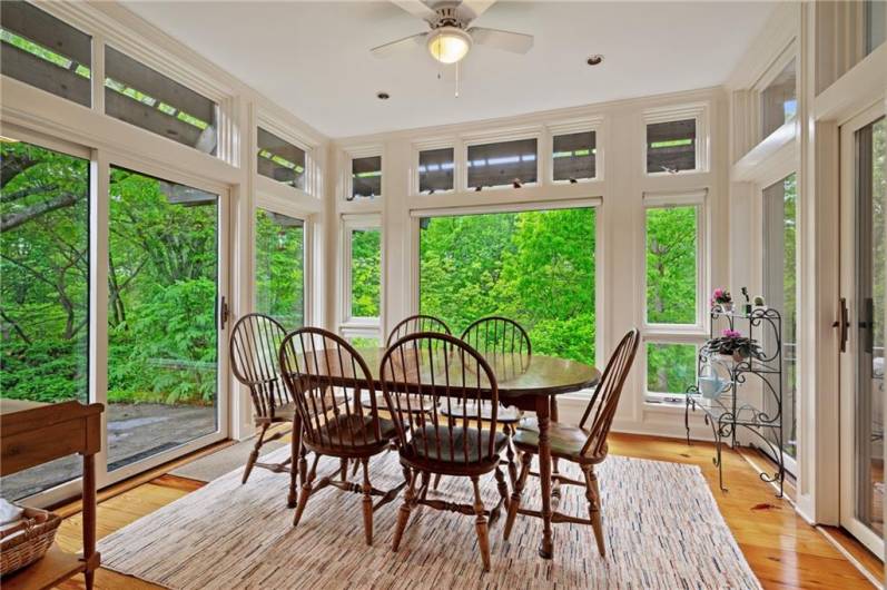 Enjoy the garden while you eat!  Exit on left through sliding glass door to a small patio.