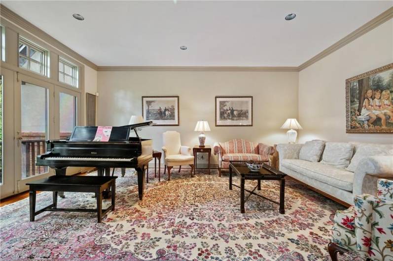 Large living room adjacent to dining room