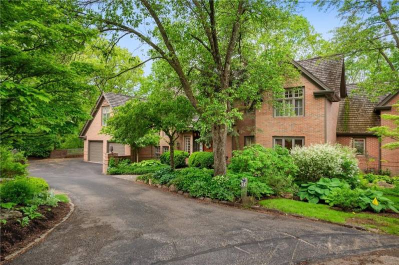 Driveway leading to home from street.