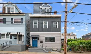 Standalone detached home! Roof deck with city views! Yard! 2-car off-street parking!