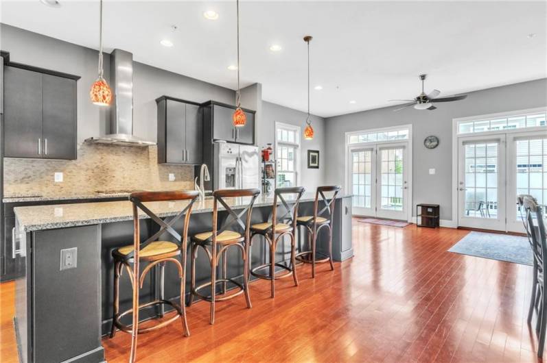 Expansive island in a well equipped kitchen