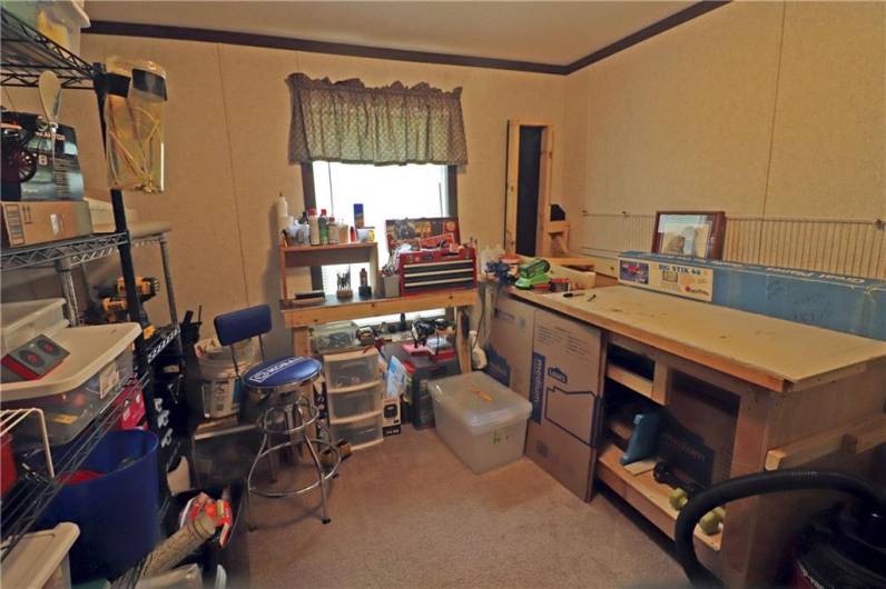 3rd Bedroom is currently being used as a workshop.