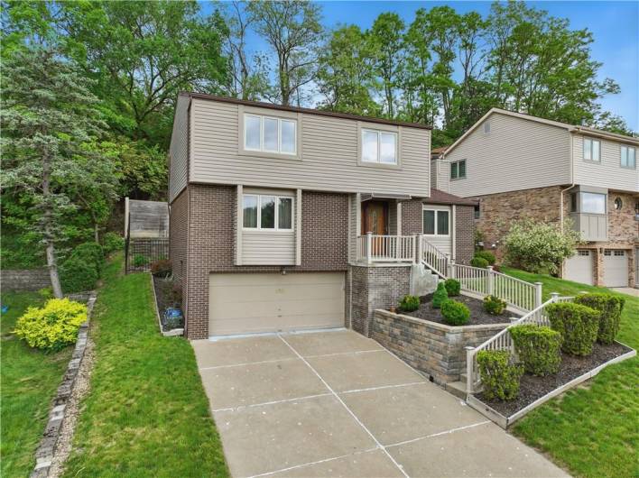 Wide Driveway And 2 Car Integral Garage