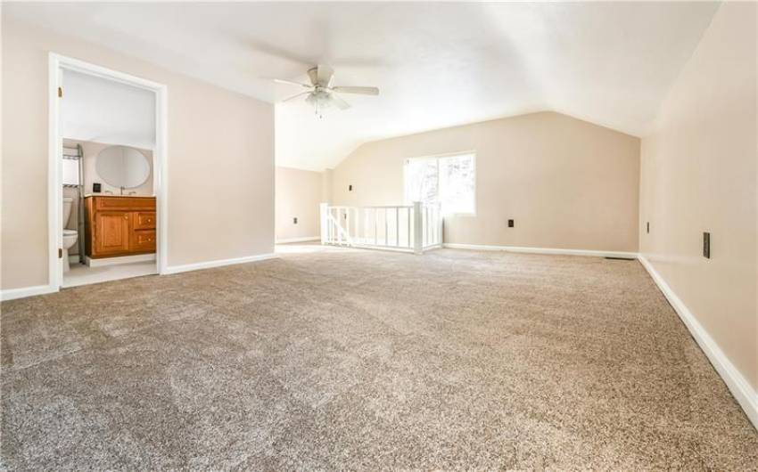 2nd floor bedroom with full bath approximately 19x19
