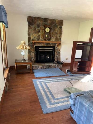 Cozy Living Room with Wood Burner