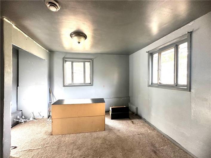 This room can be turned into a kitchen & Laundry