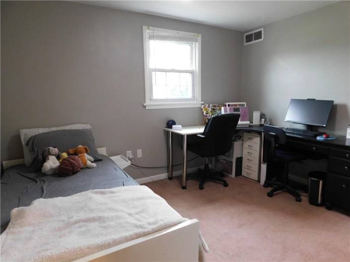 Bedroom # 5 with windows, closet, and ceiling light.