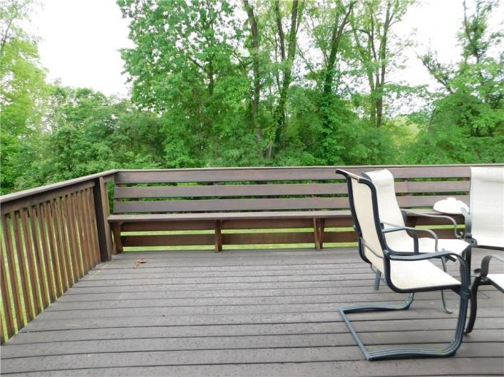 Great deck for grilling out and overlooking the large private wooded lot.