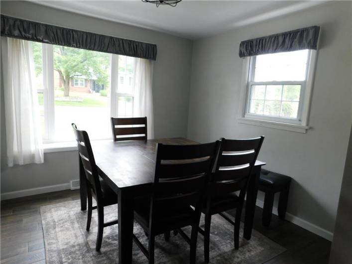 Kitchen Dinette area with windows that bring in lots of natural light.