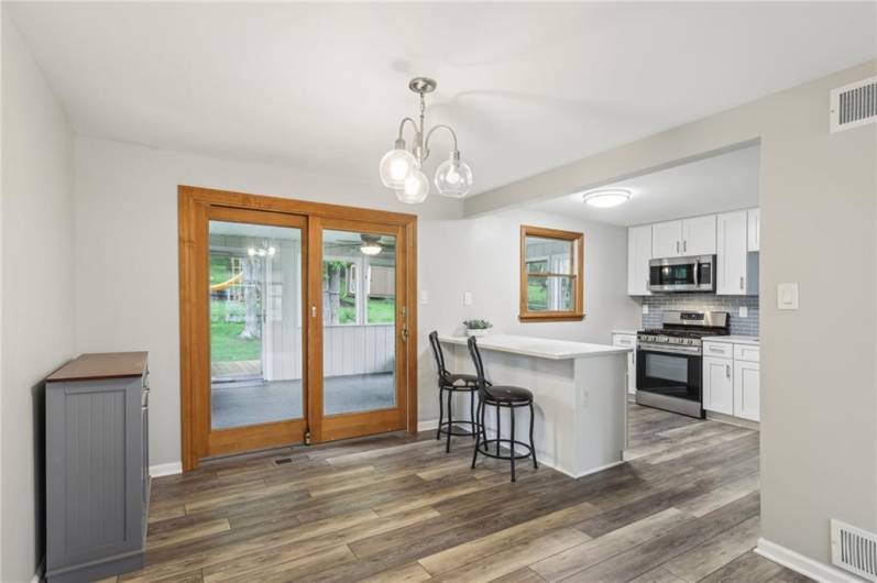 EAT_IN KITCHEN w/ view of backyard and access to the screened in porch - extra flex space!