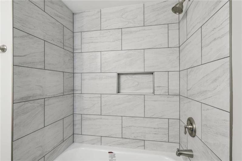 Amazing Tile workmanship & new tub!