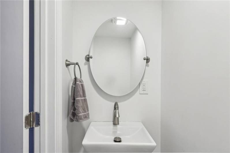 Updated clean and bright lower level half bath