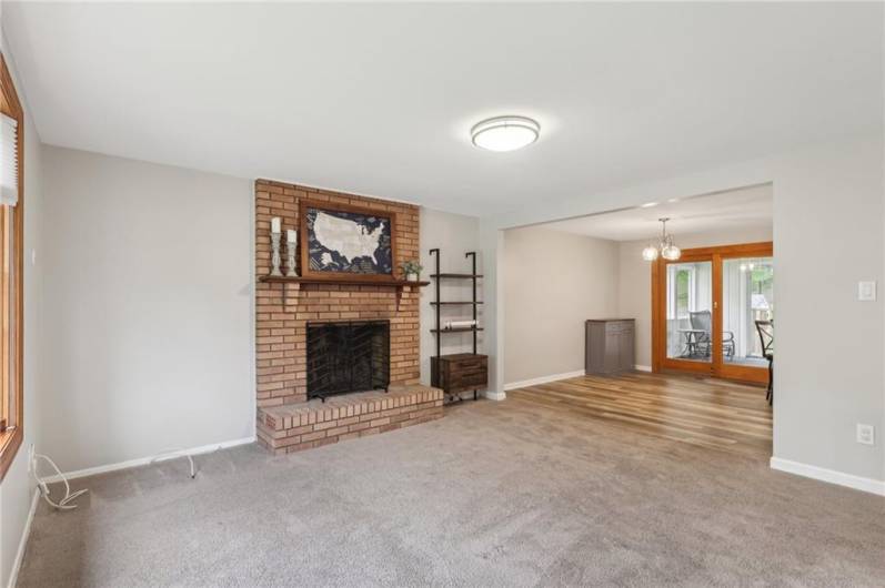 View Toward Fireplace toward Dining Area and Back Door