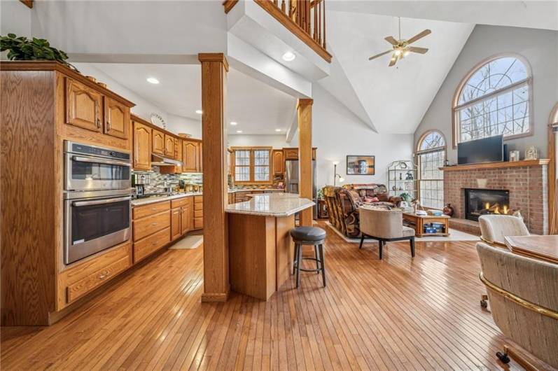 Kitchen open concept with sitting area and access to composite deck