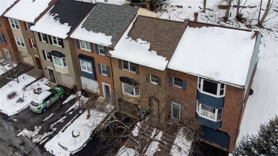941 Trillium is located second from the right with brown brick, newer roof and asphalt driveway.