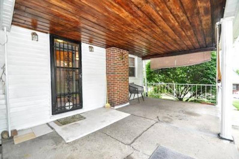 This is the side porch, let's go inside.