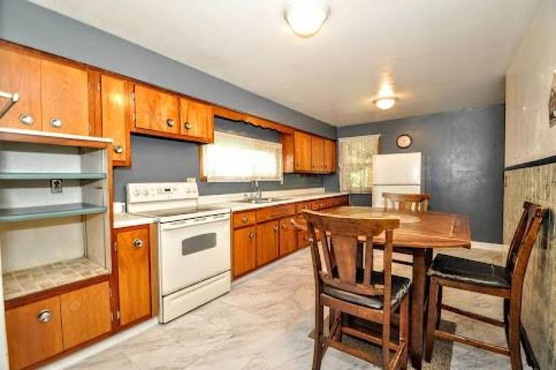 Open cabinet is great for your microwave, eat-in or bring an island for meals.