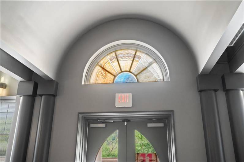 Stain glass above rear entrance