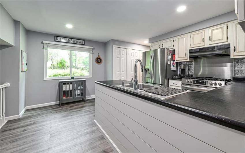 Large pantry in kitchen with additional space for small table if you prefer an eat in kitchen.
