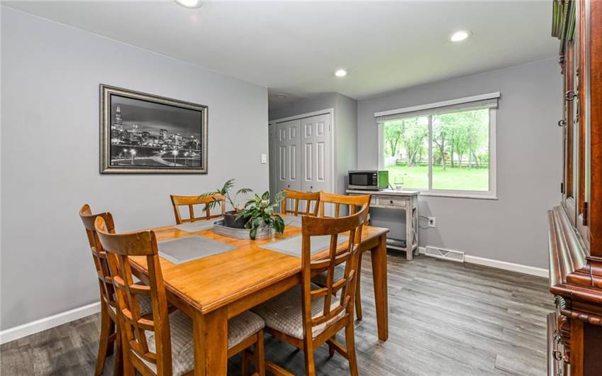Dining room has plenty of room for family and friend gatherings.