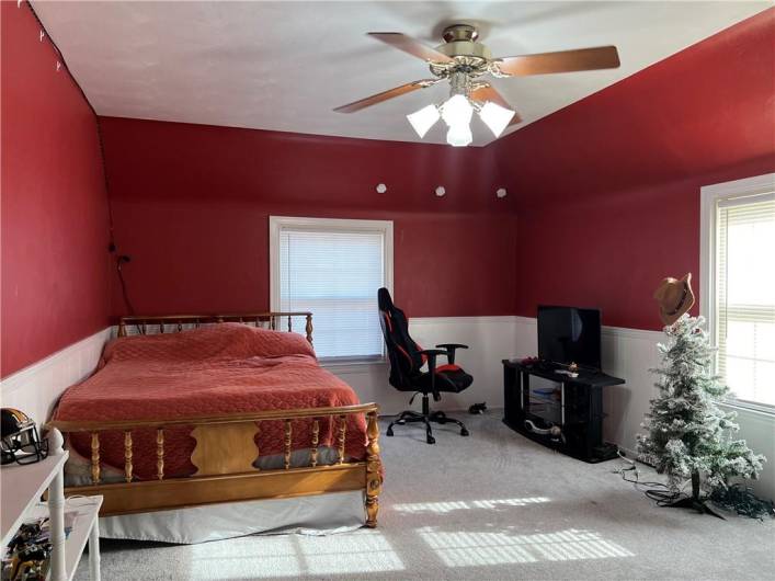 Upper level bedroom. Hardwood flooring under carpet.