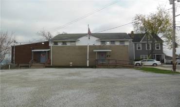 View of Existing Building which would be torn down by Buyer for Development