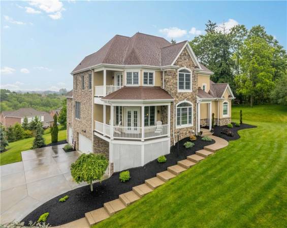 Beautiful wrap around porch even has surround sound speakers.