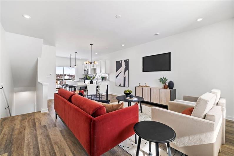 Living room *Photo of model home at 21 Rose