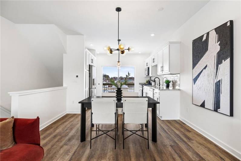 Dining room at the open floor plan *Photo of model home at 21 Rose