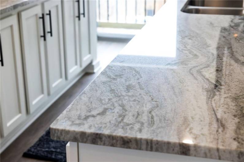 Kitchen *Photo of model home at 21 Rose
