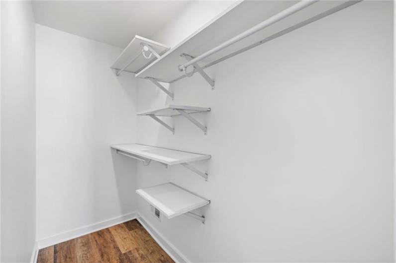 Primary walk-in closet *Photo of model home at 21 Rose