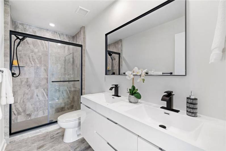 Primary bathroom *Photo of model home at 21 Rose