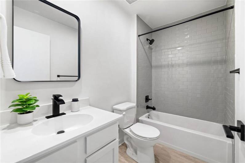 Upper hall bathroom *Photo of model home at 21 Rose