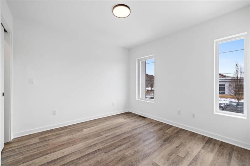 Second bedroom *Photo of model home at 21 Rose