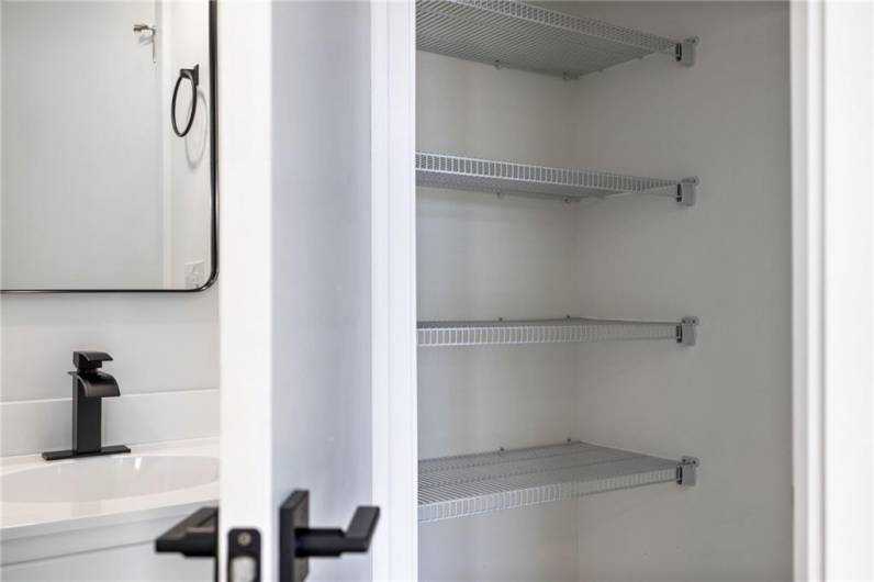 Linen/utility closet *Photo of model home at 21 Rose