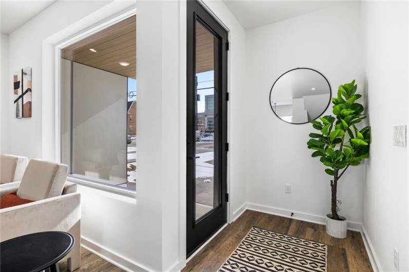 Interior view of the entry *Photo of model home at 21 Rose