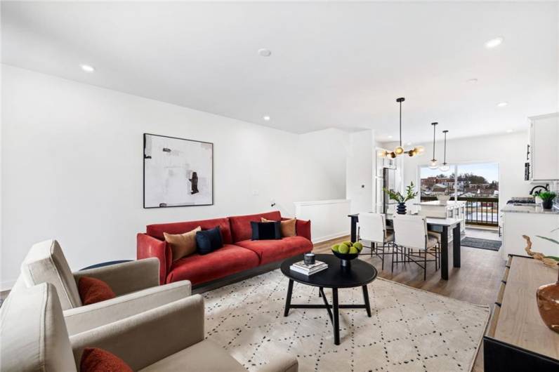 Spacious living room with an open floor plan *Photo of model home at 21 Rose