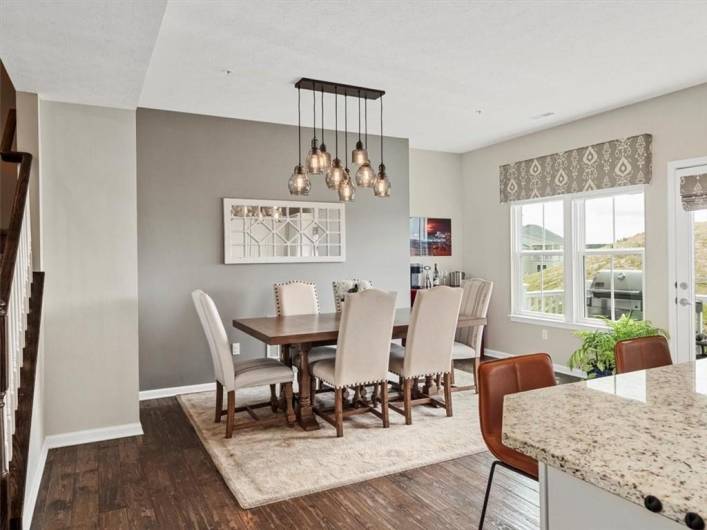 Open to both the kitchen and living areas, this space is perfect for effortless entertaining and everyday comfort.