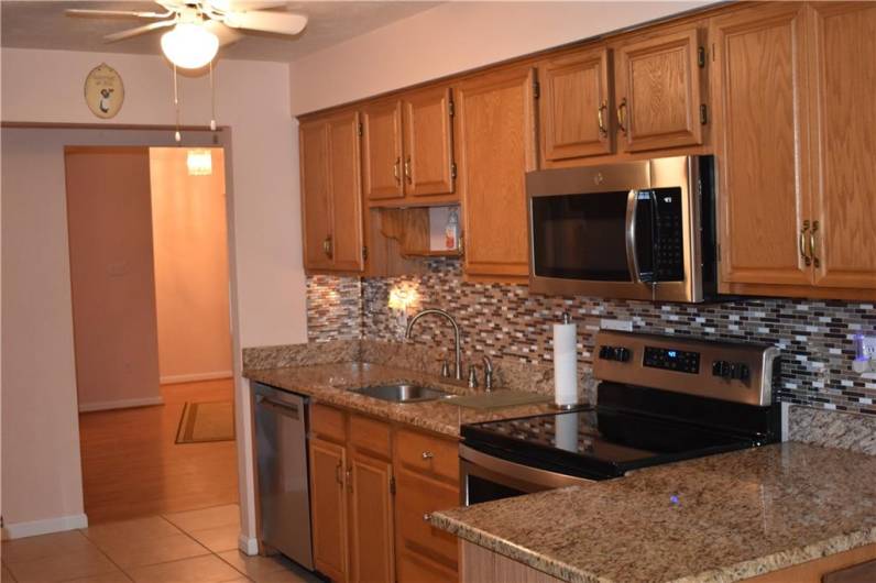 Featuring Granite Countertops.