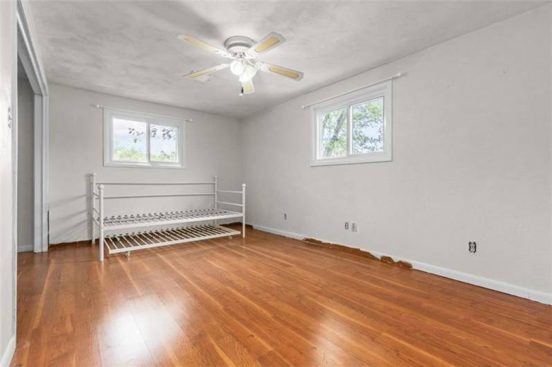 Bedroom 3 is a spacious room with large double closet  and lighted ceiling fan. NOTE: Bedroom 3 is a captive room, accessed thru BR 2.