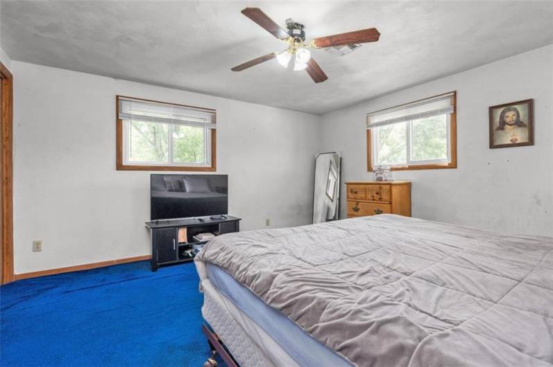Bedroom 4 is a spacious room with a double closet and lighted ceiling fan. NOTE: Bedroom 4 is a captive room accessed thru BR 2.