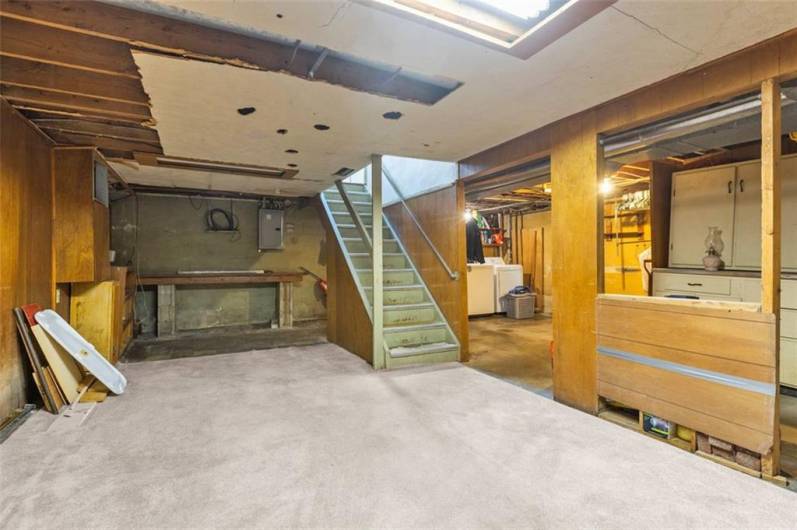 Lots of potential here! Gameroom and work shop area...