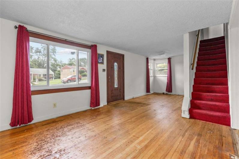Combination living room-dining room is light and bright...with kitchen access on the dining room side.