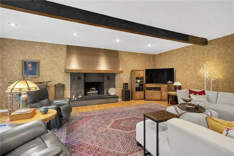 Family room with copper overlay gas firesplace