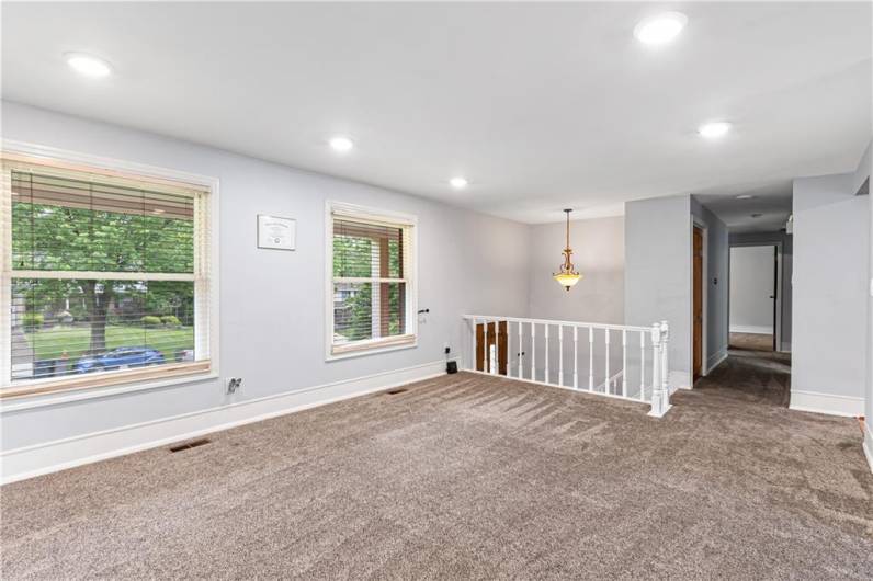 Facing the entry and bedroom hallway