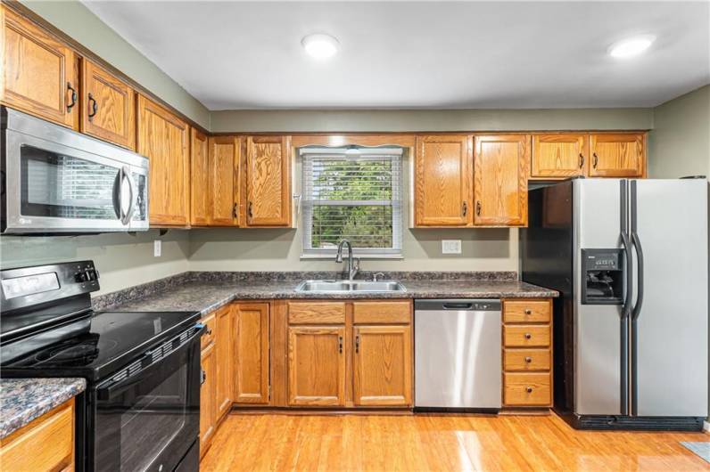 Plenty of cabinets and counters.