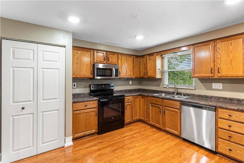 Kitchen features a brand new dishwasher.