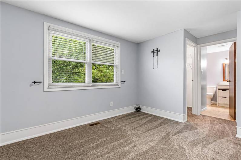 Master bedroom features a large walk-in closet and en-suite bathroom.